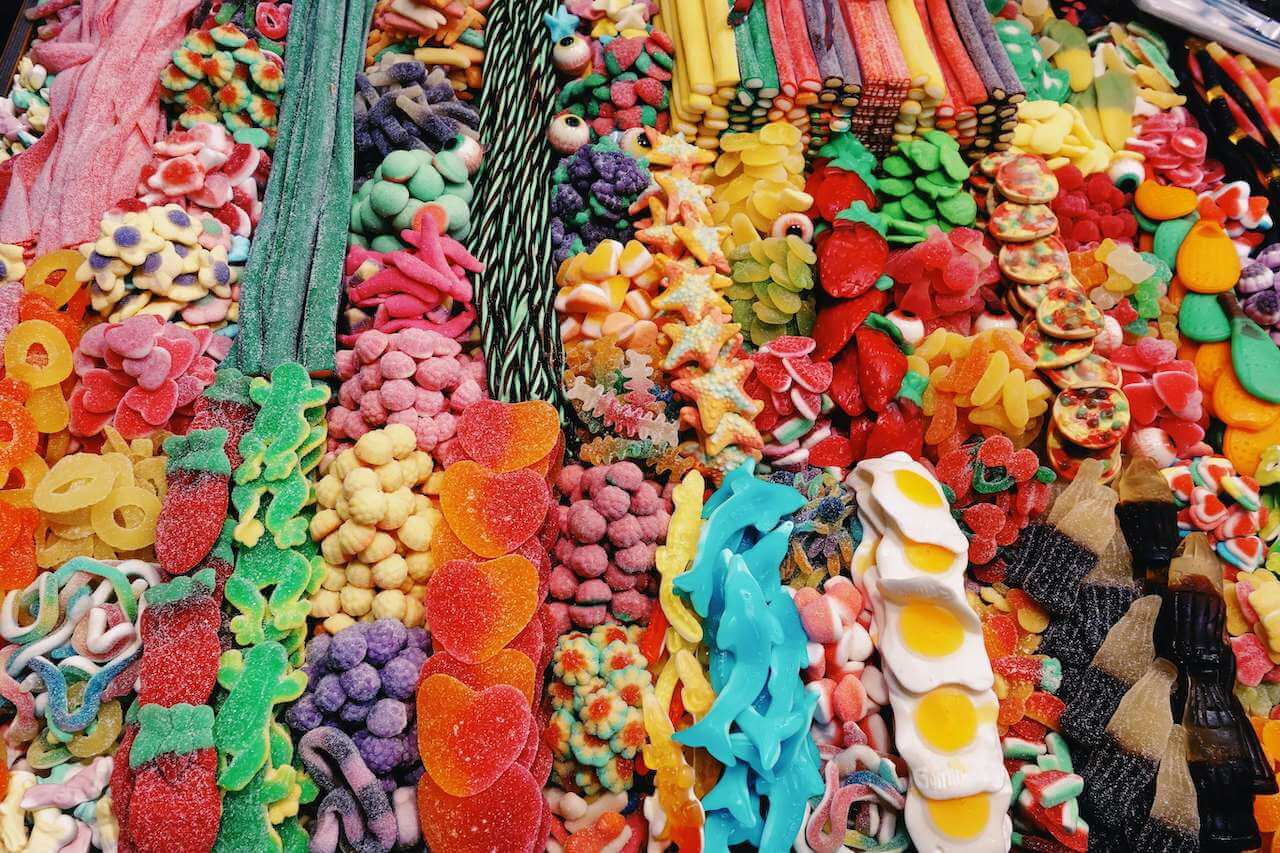 Fulfillment for sweets. Picture of jellies of different sizes, shapes and colours arranged in an interesting composition. 
