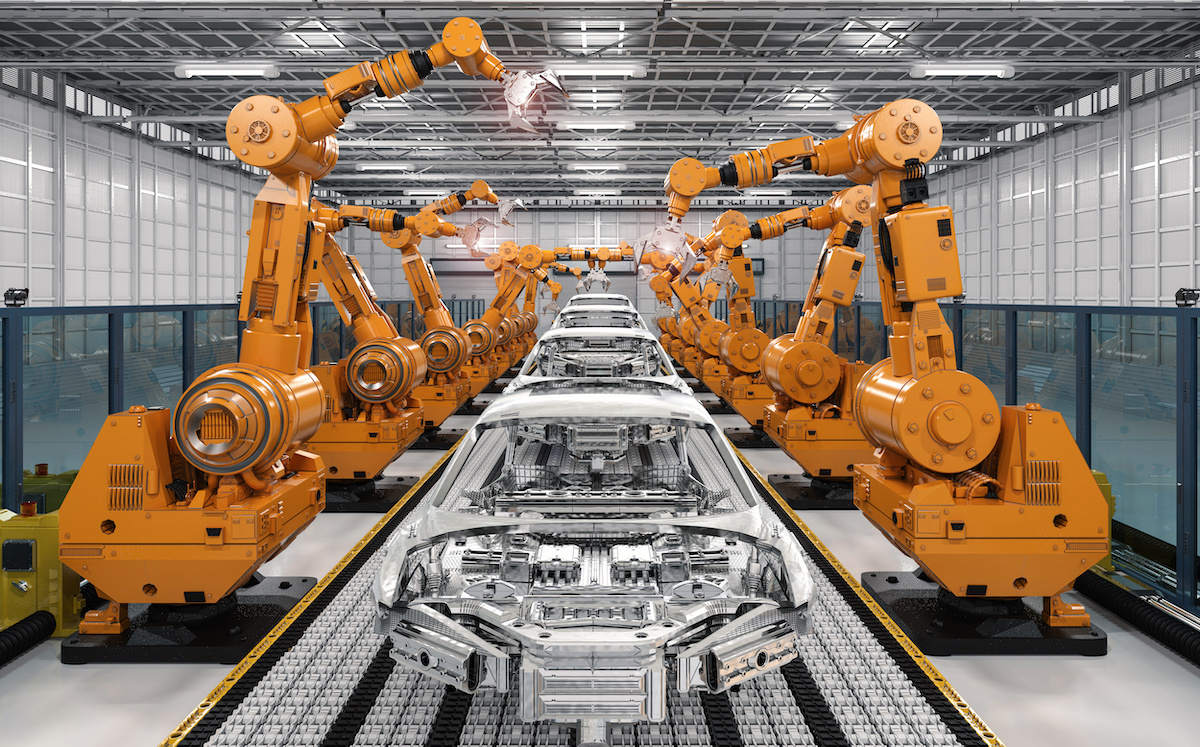 Fulfillment for industry: automotive. Picture showing robot assembly line in car factory.