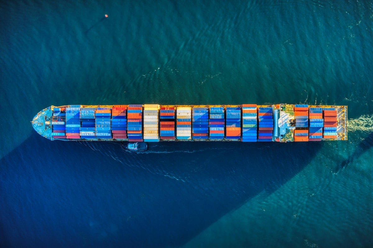 Green shipping: 5 best practises to be more eco-firendly. Aerial view of a transport vessel.